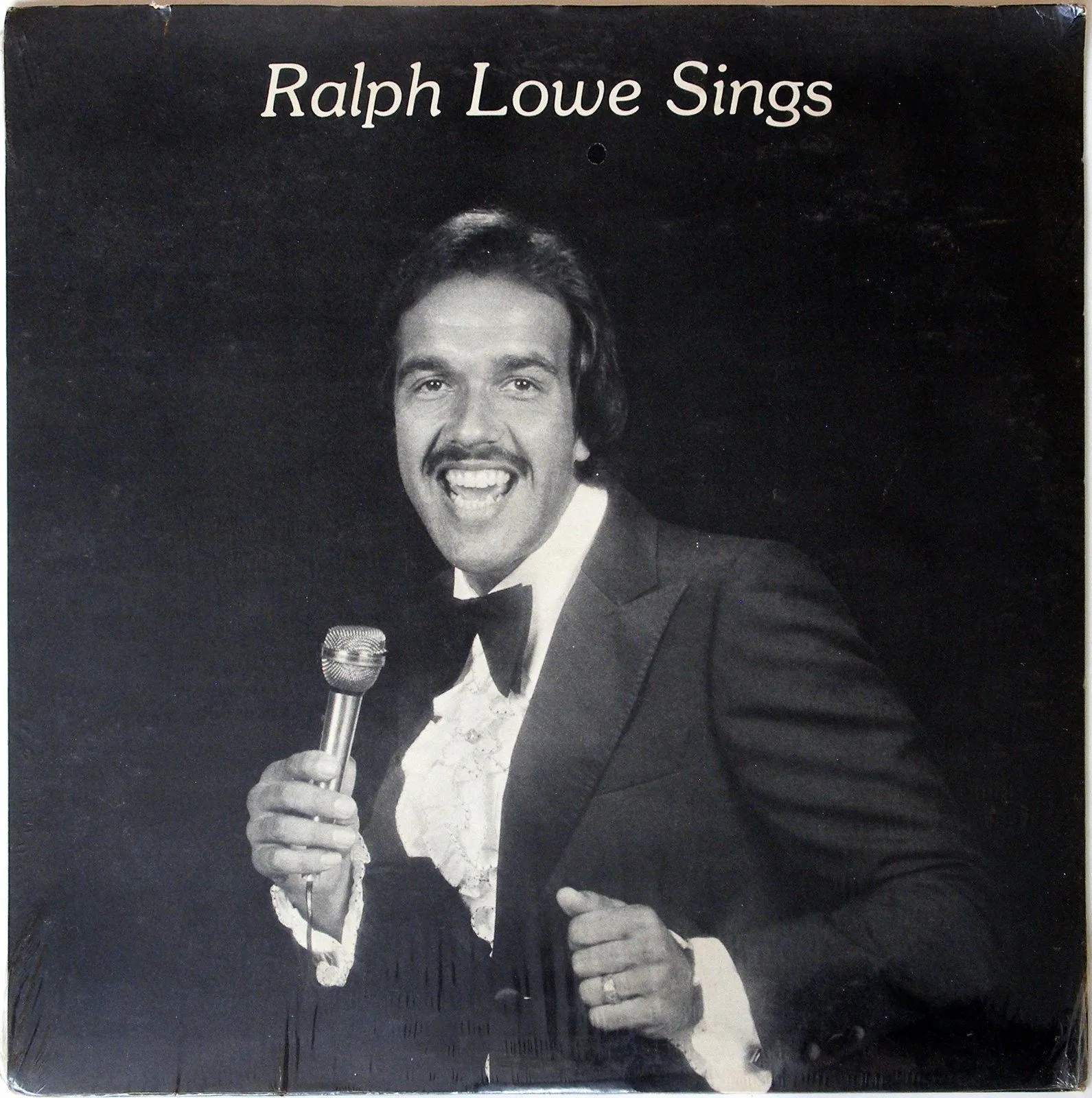 Shop Stupid Websites, Buy Stupid Products - Drunk Cat Presents the Carousel of Drunk Products - Self Published Airport Lounge Singer Ralph Lowe